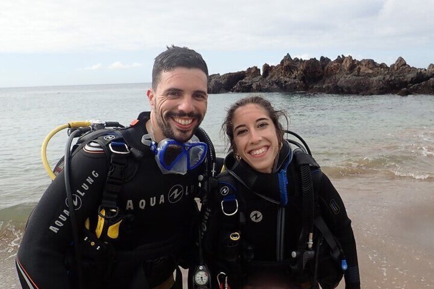 Happy smiles all around after a fantastic first dive!
