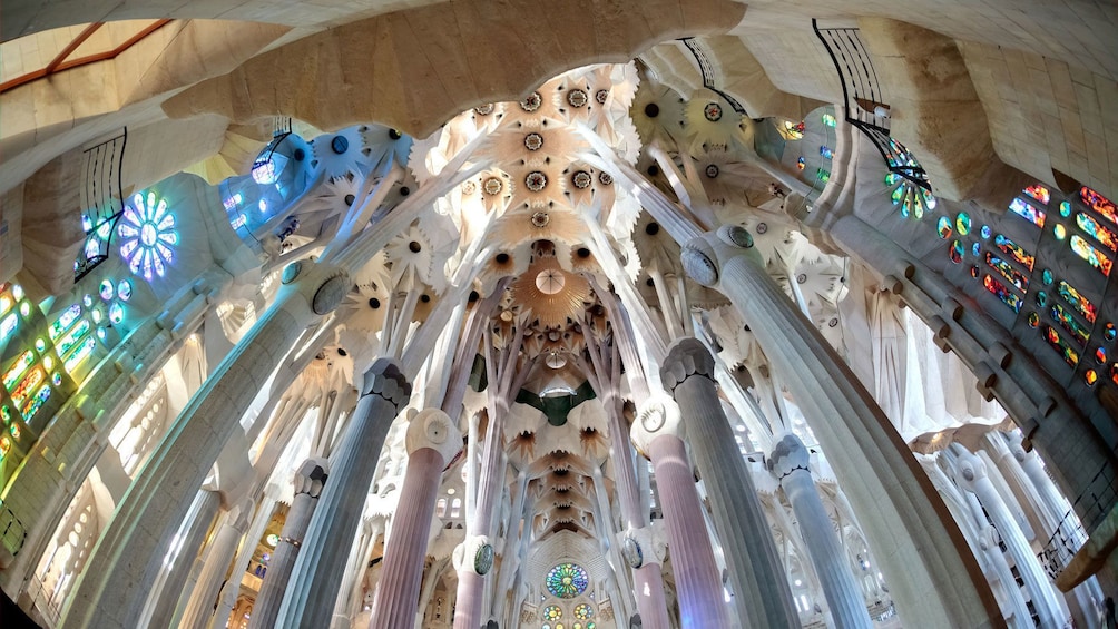 Colorful domed interior of Sagrada Familia in Barcelona