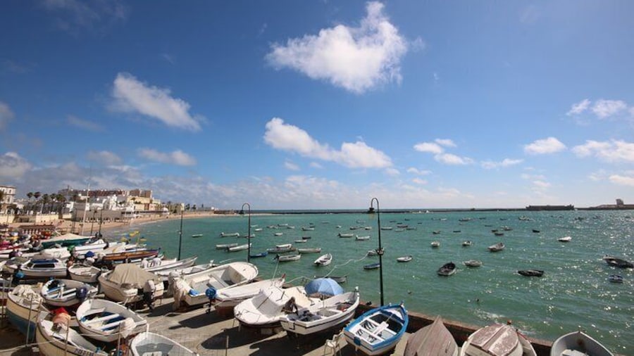 Stroll along La Caleta beach, Cadiz on this shore excursion