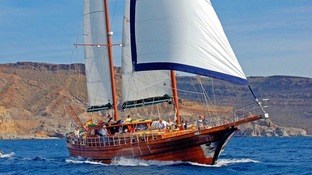 Boat full of guests exploring the coast of Fuerteventura