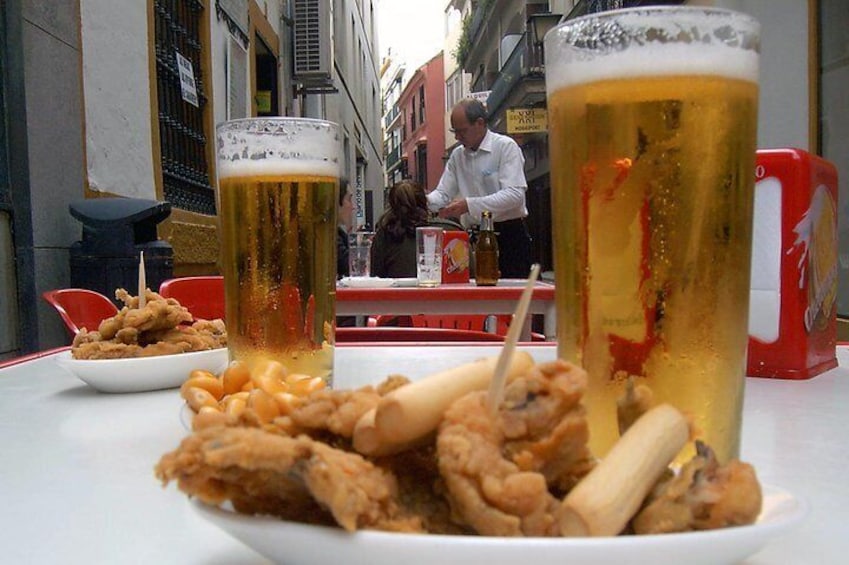 Reeds and typical fried fish of Blanco Cerrillo in the surroundings of Calle Sierpes