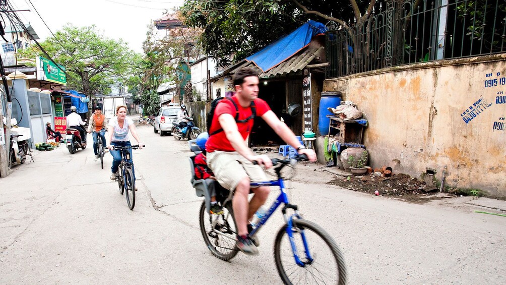 Bicycling group on a street in Hanoi