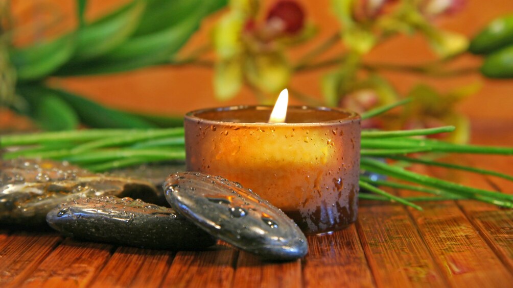 Candle and hot stones at a spa in Siem Reap