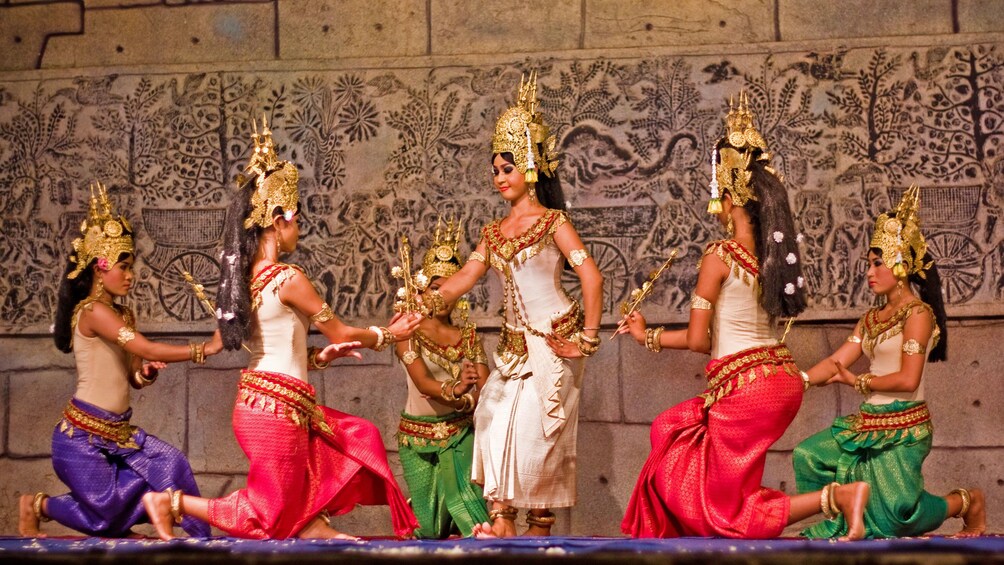 Apri foto 1 di 9. women in traditional costume kneeling on stage in Cambodia