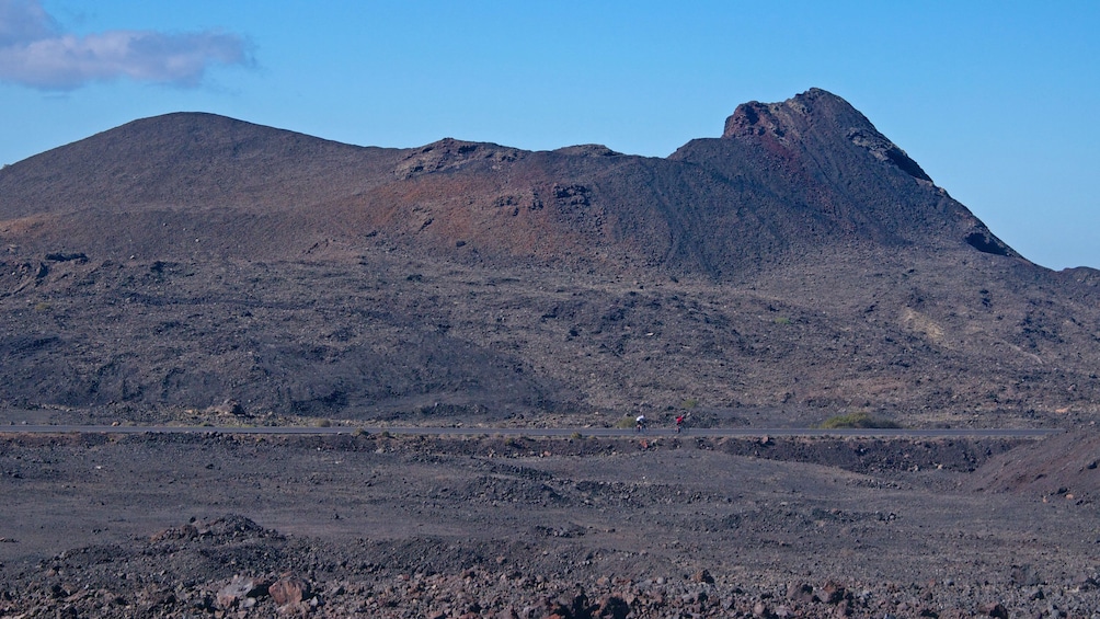 Biking along the barren landscape in Lanzarote
