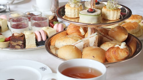 Trays of pastries and desserts at high tea in Penang