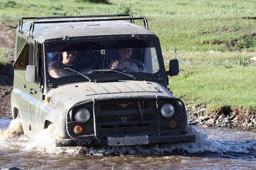 Tourists driving a russian 4x4