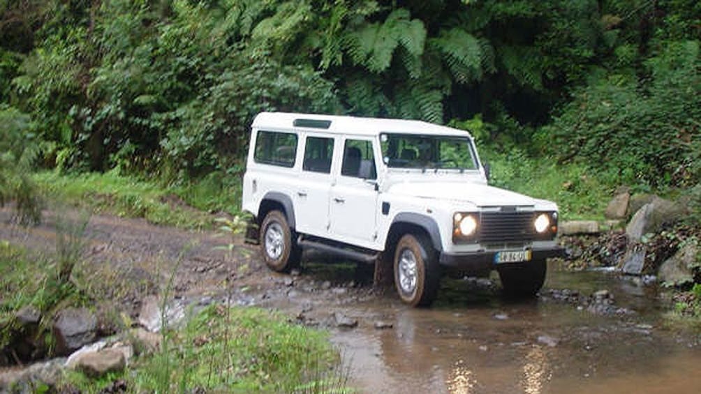 Jeep on a muddy road on Madeira Island