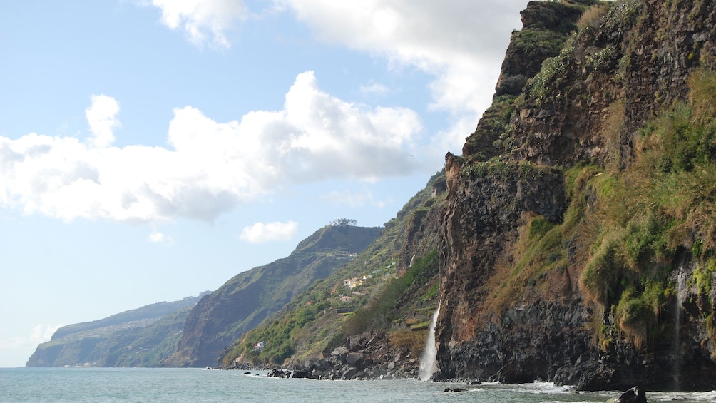 Coastal cliffs and waterfalls on Madeira Island