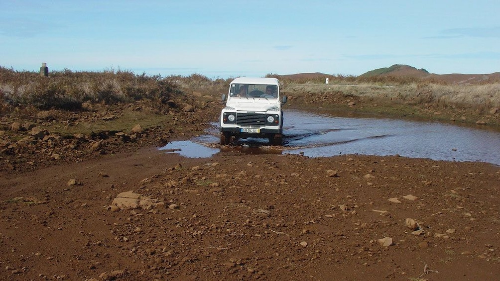 Jeep on a muddy road on Madeira Island