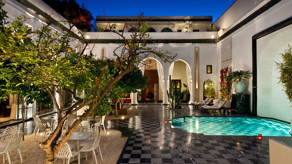 a pool in a courtyard in marrakech