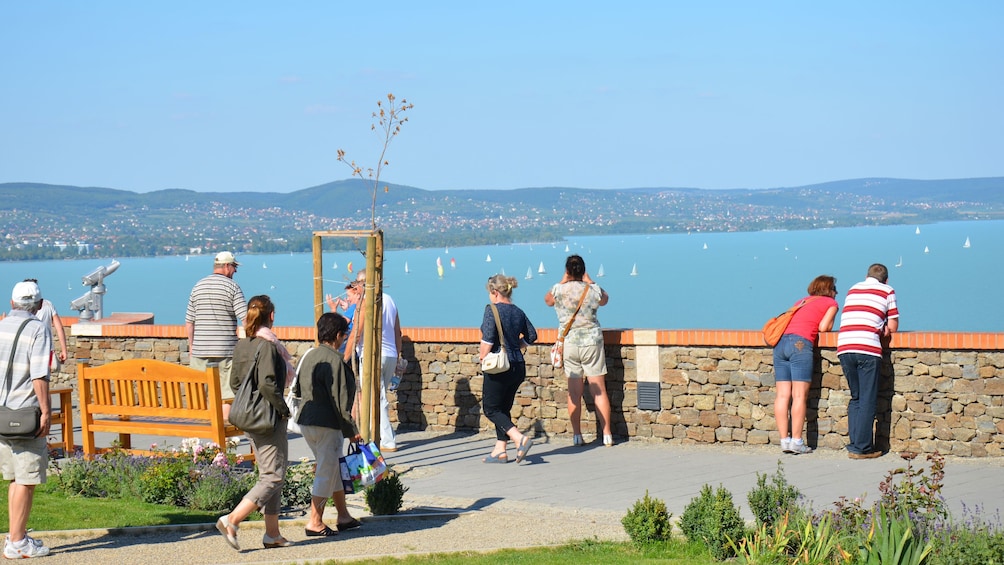 People looking out at the water at Lake Balaton