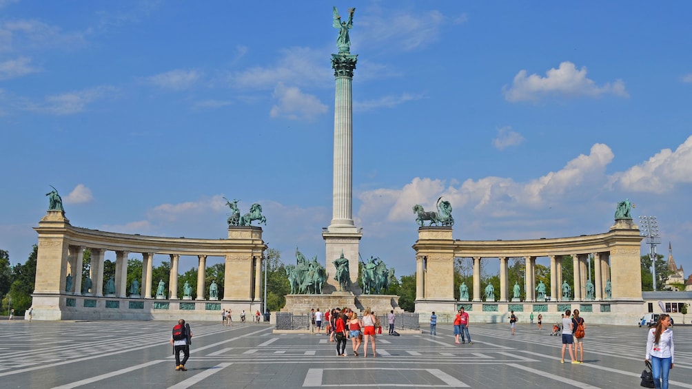 A group of people in front of a monument in budapest