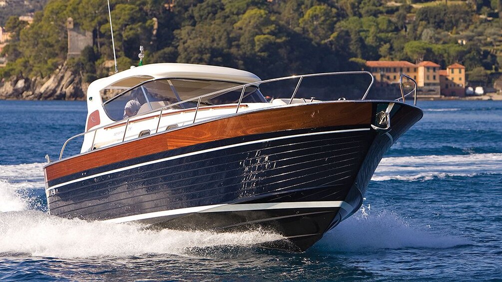 A boat sailing past Sorrento