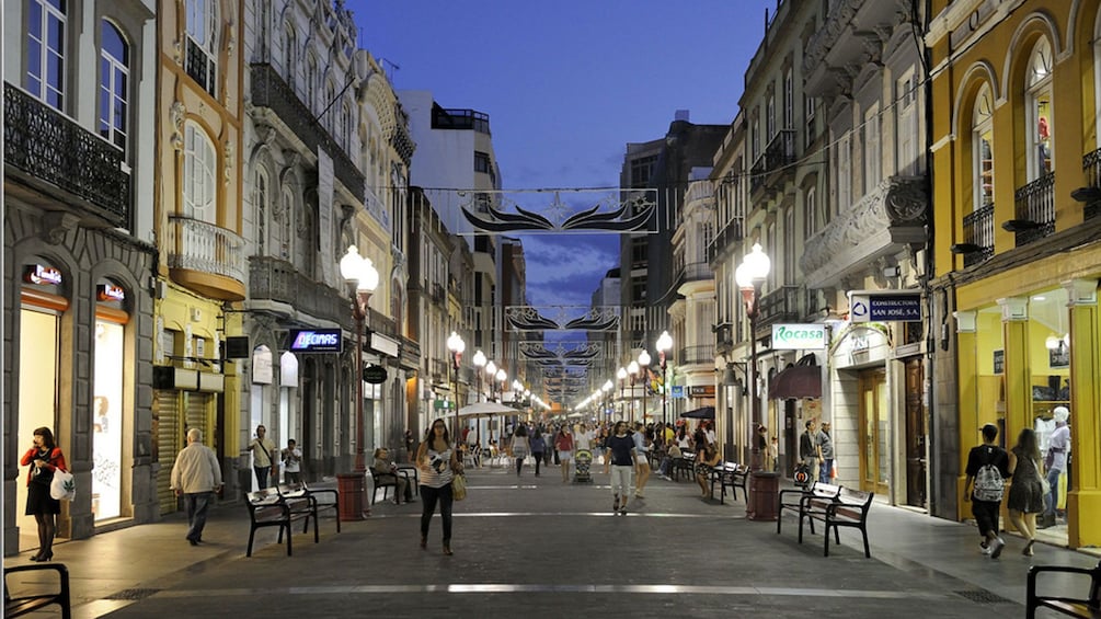 Pedestrian street and shops at night in Las Palmas de Gran Canaria