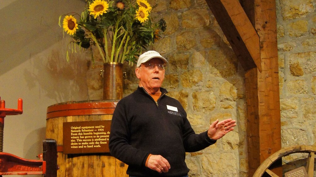 guide leading the group at the winery in San Francisco