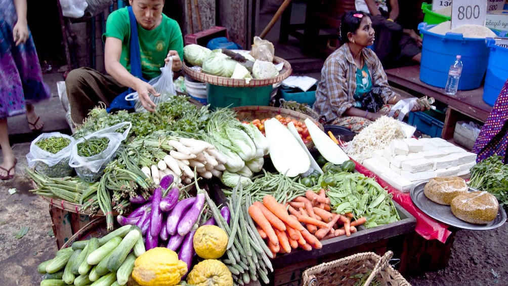shopping for produce at the market in Yangon
