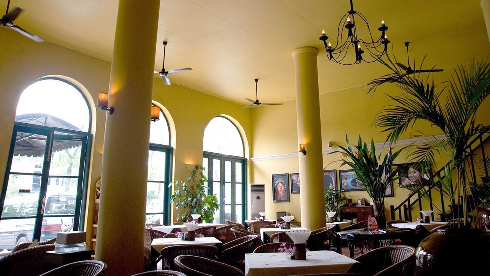 interior dining space with large windows in Yangon