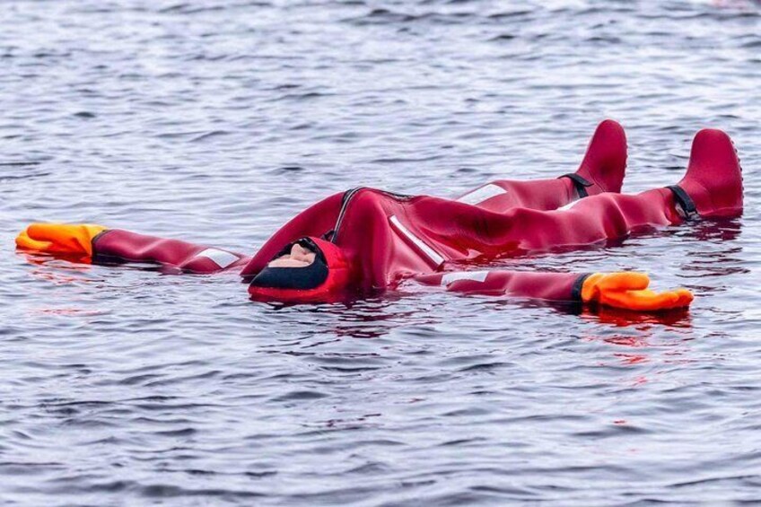 Dry-suit floating in Lake Saimaa