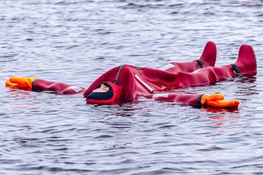 Dry-suit floating in Lake Saimaa