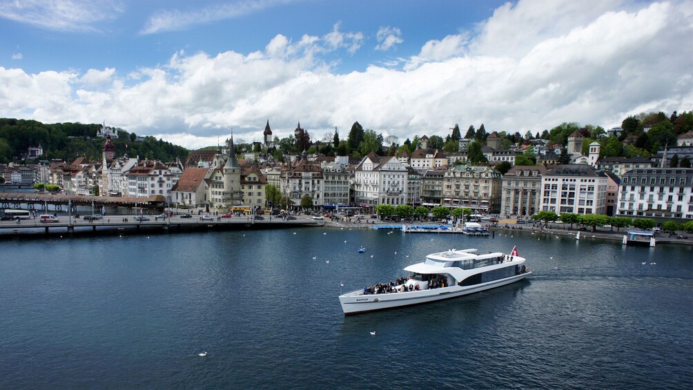 Tour boat with the city in the background in Lucerne
