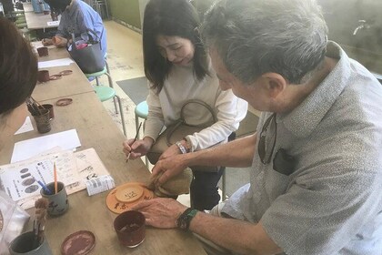 Japanese traditional craft "stand pile burning experience" and sightseeing ...
