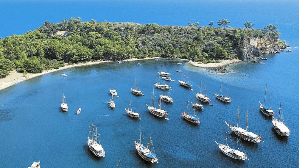 A group of boats anchored off the coast of Kemer