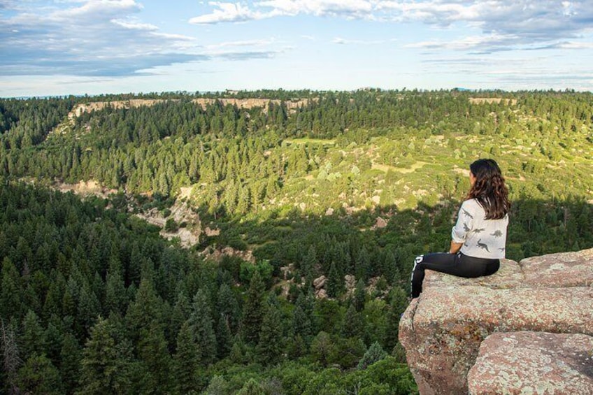 Sitting on the cliffs at Castlewood Canyon