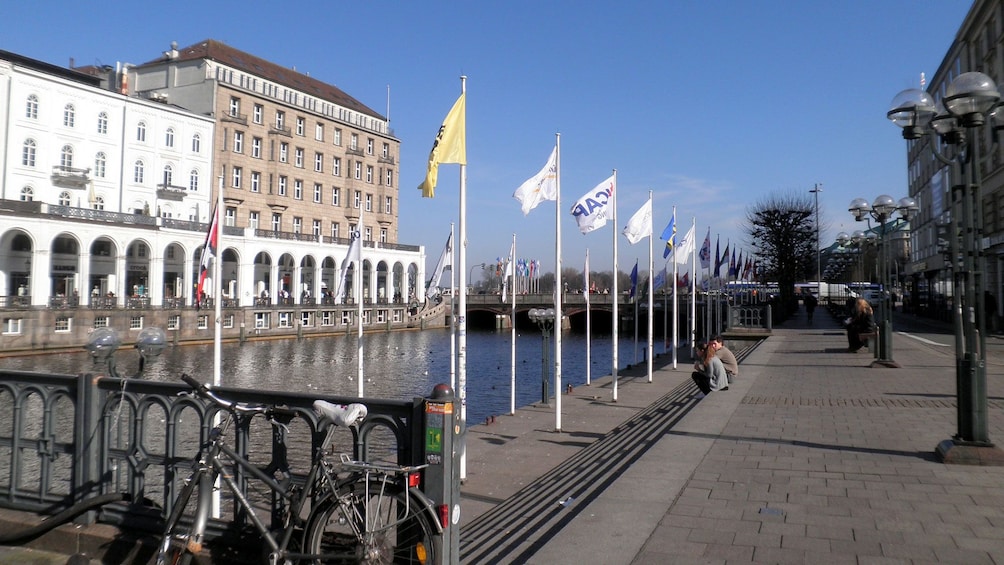 Show item 1 of 5. raised flags along the water channel in Hamburg