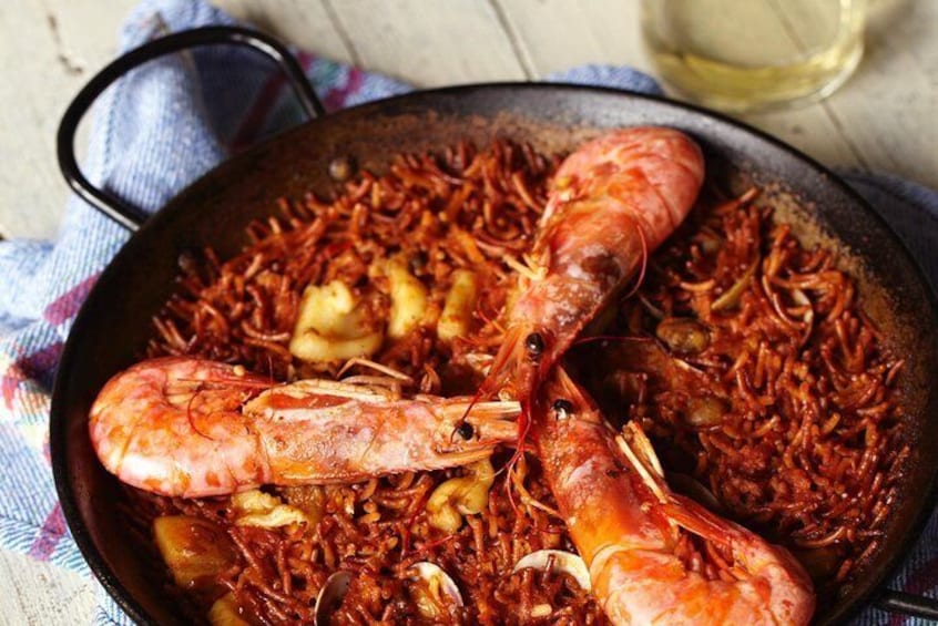 Paella class overviewing Las Ramblas & Boqueria Market at Barcelona Cooking