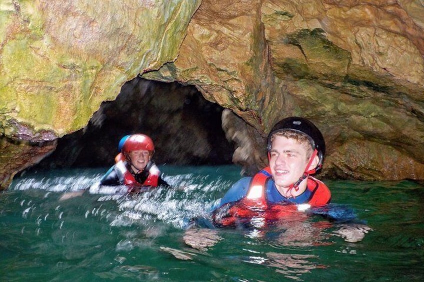 Discover sea caves along the coast with Coasteering