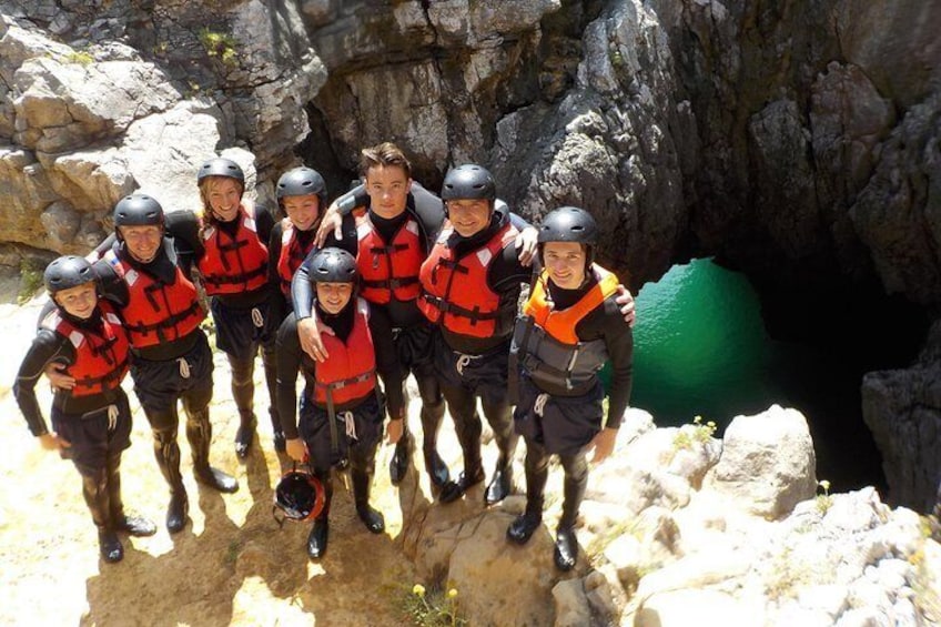 Coasteerers after jumping inside the blowhole of a sea cave