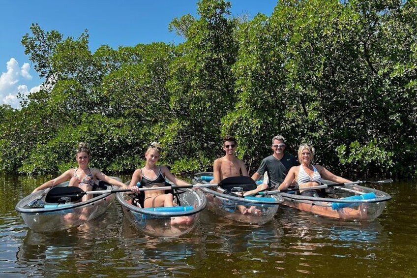 CLEAR kayaks beside the mangroves after stopping at the island's quiet beach