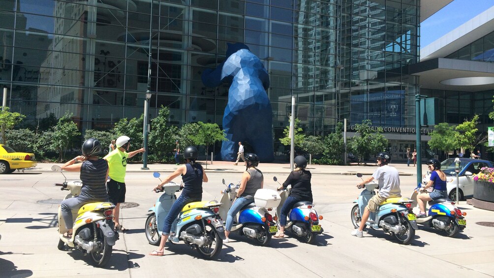 Scooters lined up to tour through Denver