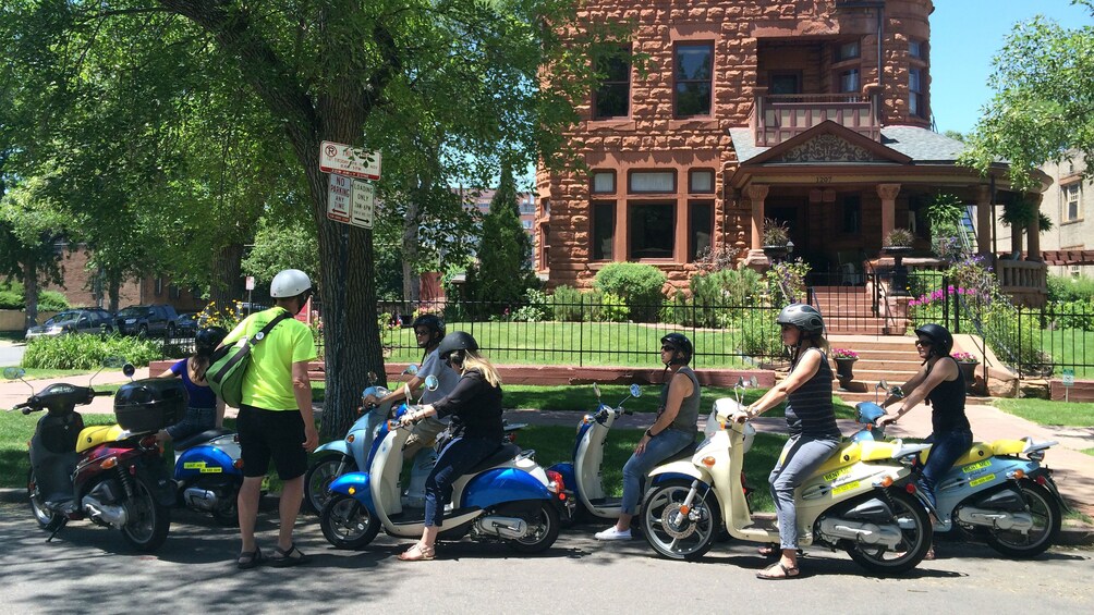 Explore historic buildings of Denver via scooter