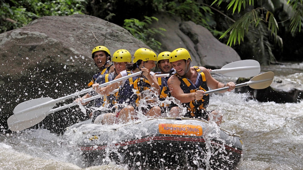 Tampilkan item 2 dari 6. Rafters navigating a river in Bali
