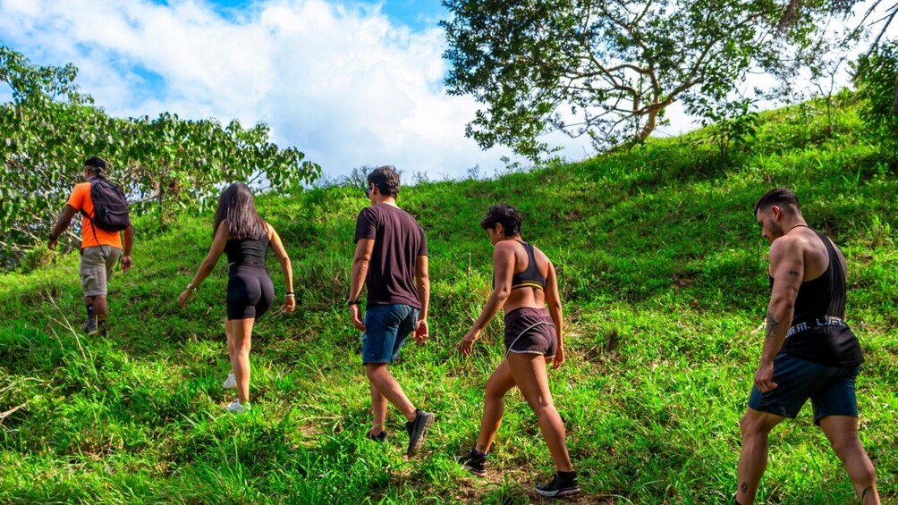 Hiking group walks on path near Puerto Vallarta
