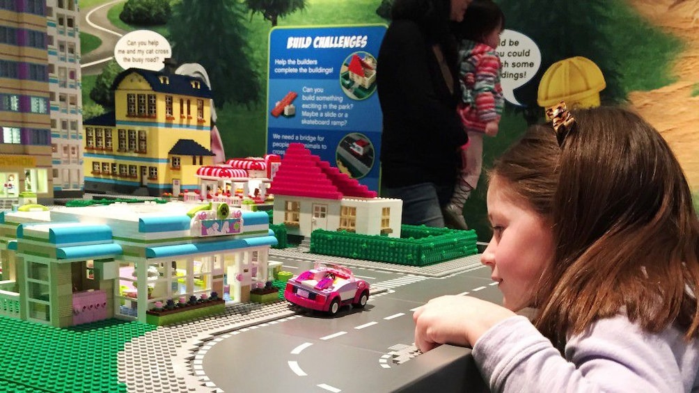 Child playing with Legos