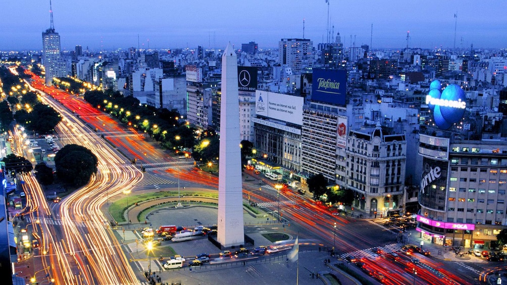 city lights around a standing monument in Argentina