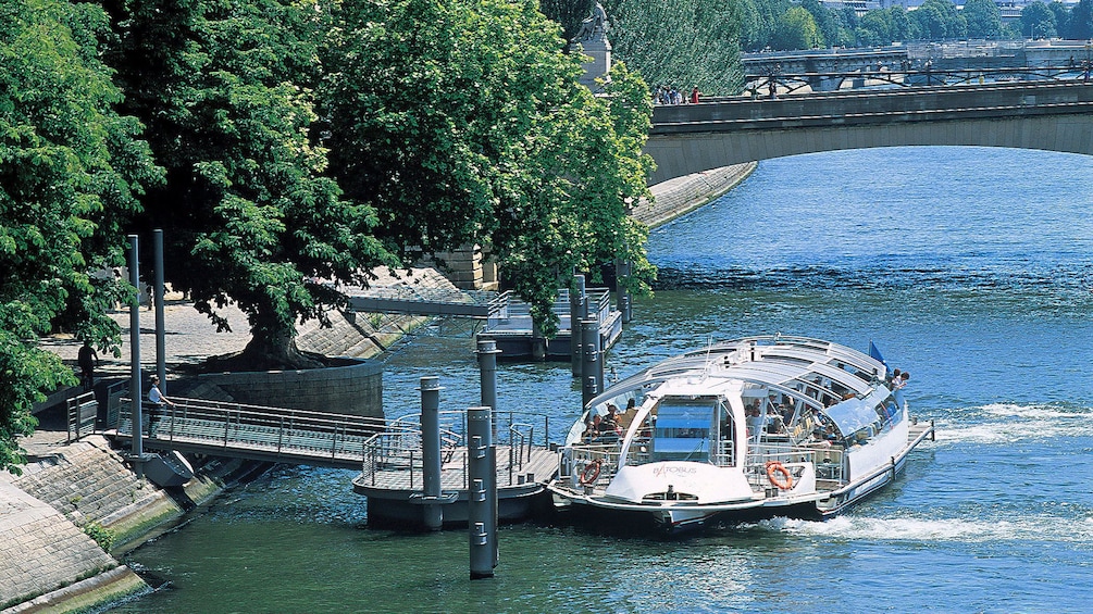 Batobus docked on the Seine river. 