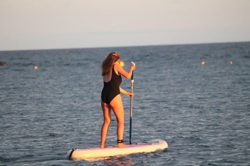 sunset stand up paddle