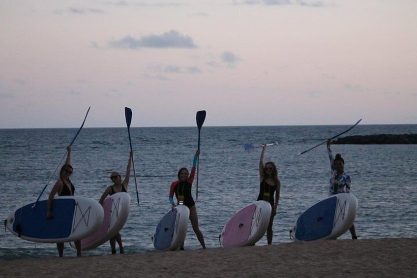 sunset stand up paddle