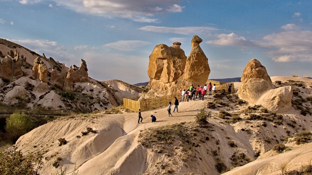 Tourists viewing beautiful landmarks of Cappadocia 