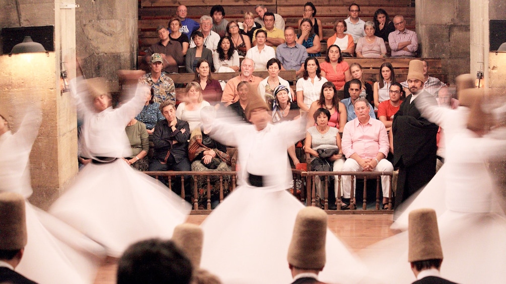 Guests enjoying the Whirling Dervishes Show in Cappadocia 