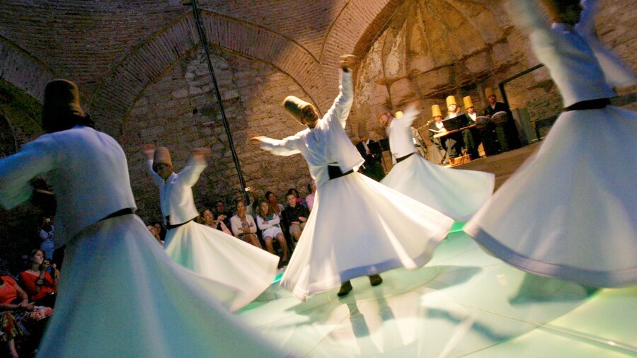 Performers dancing at the Whirling Dervishes Show in Cappadocia