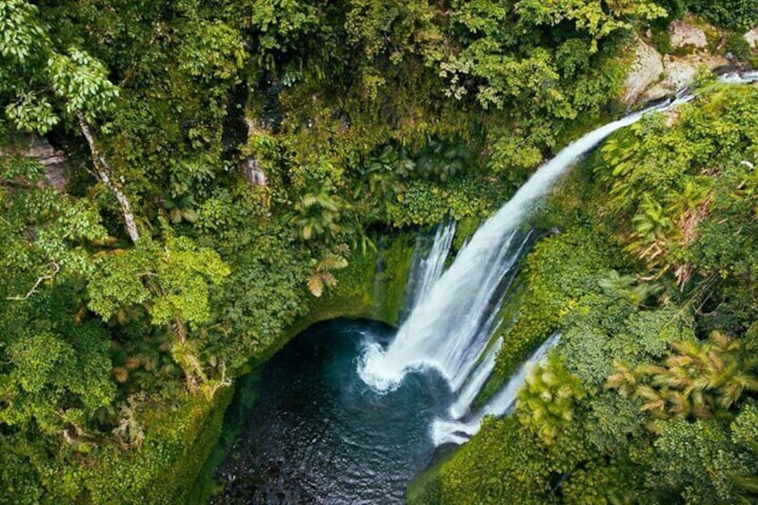 Tiu Kelep Waterfall Refreshing Pool Below the Impressive Cascade.
