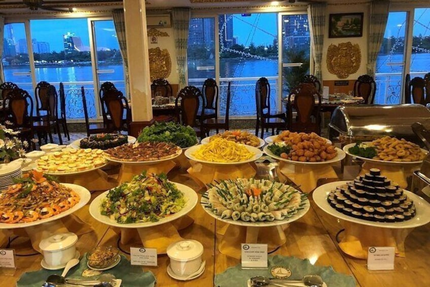 Enjoy a sumptuous dinner with a wide variety of Asian and Western dishes on board the cruise.