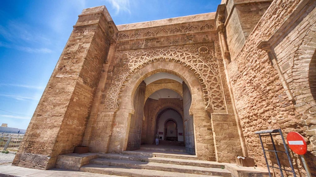 ornate arched entry to large building