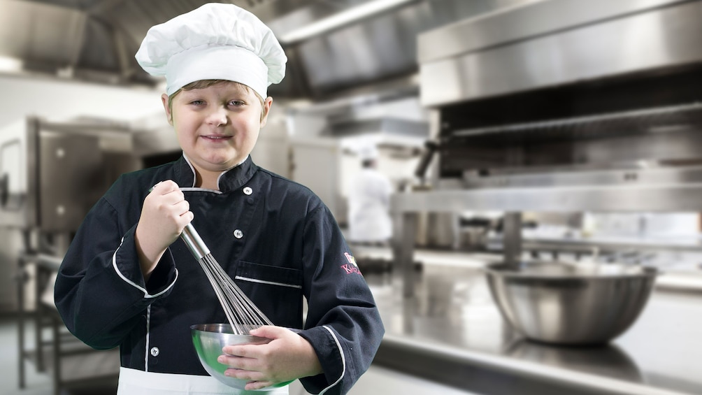 Show item 4 of 10. child dressed as a chef in Dubai