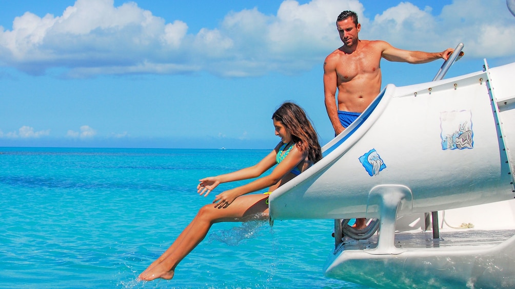 Woman sliding in a water slide in Turks and Caicos Islands